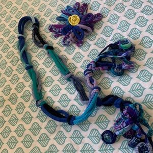 Funky boutique rolled fabric necklace with pin / pendant